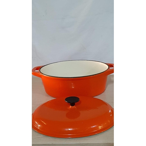 25D - 'Vogue' Large Cast Iron Oval Lidded Casserole Dish, Enameled, Off White Interior and Orange Exterior... 