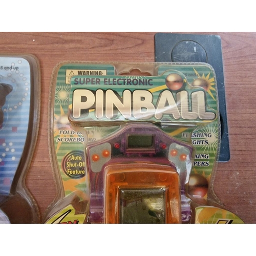 156 - Collection of 6 x Vintage Handheld Electronic Pinball Games, in Original Plastic Packaging, (Unused,... 