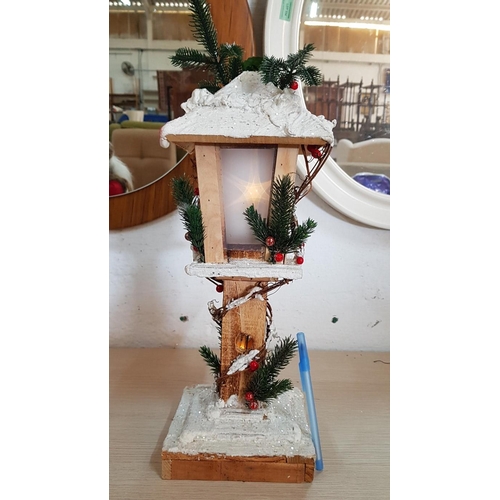 26 - Snow Topped Wooden Lamp Post (H: 44cm) and Santa Figure Carrying Gifts, (H: 37cm), (2)