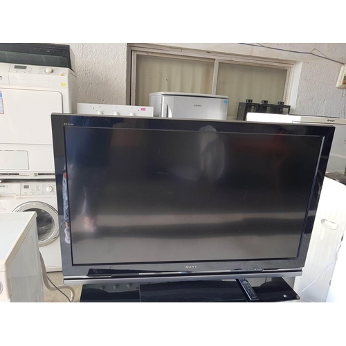 322 - Sony 52'' LCD Digital Colour TV, (Model: KDL-52W4000) with Remote Control, Together with Modern Blac... 