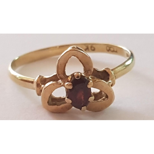 229 - 9ct Gold Celtic Design Ring with Burgundy Stone (Garnet?), (Approx. 1.6g, Size M/N).