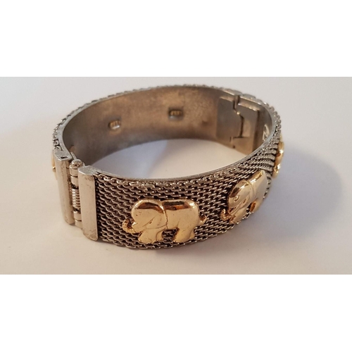 234 - Silver and Gold Tone Bangle Bracelet, Decorated with Elephant Image. (Approx. 6.5cm x 5.5cm).