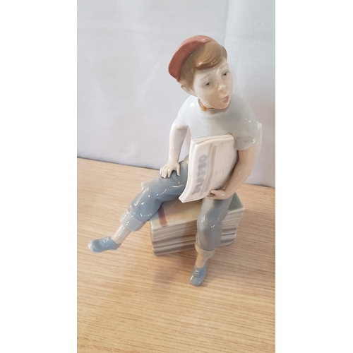 133 - Nao by Lladro 'Newspaper Boy', Porcelain Figurine, Made in Spain, (Approx. H: 23cm) (A/F: Repair Not... 