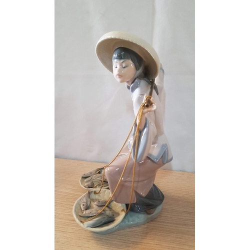 79 - Lladro 'Fish a Plenty' Porcelain Figurine, Made in Spain, (Oriental Fisherman), 1982, H:25cm.