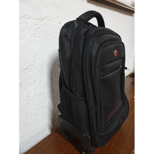 108 - Travel/Cabin Bag On Wheels With Foldaway Handle, (Approx. 55 x 36cm)