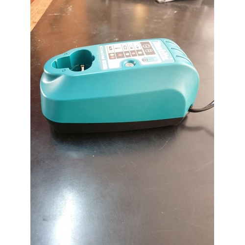 410 - Makita 7.2 - 10.8 volt Battery And Charger. (A/F, Battery Life Unkown)