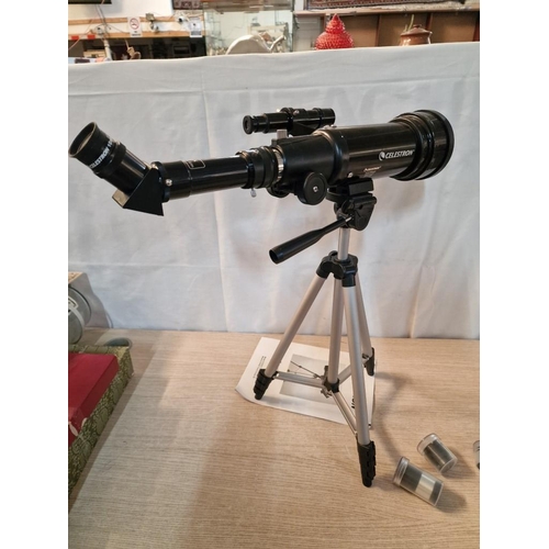 103 - Celestron Travel Telescope, (Model: 21035), on Tripod with Additional Lenses and Manual