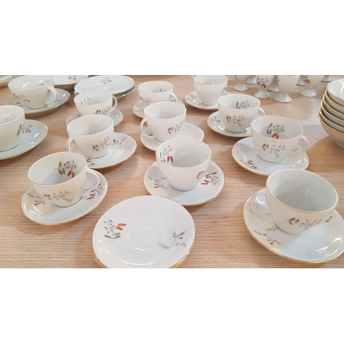 385 - ''Jarolina'' Polish Porcelain Dinner Set with Delicate Pattern of Meadow Flowers and Gold Rim.