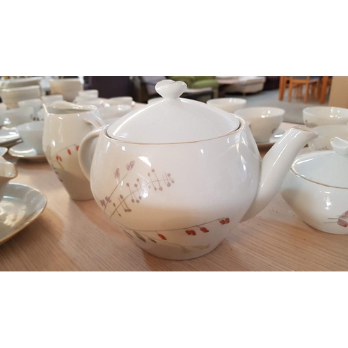 385 - ''Jarolina'' Polish Porcelain Dinner Set with Delicate Pattern of Meadow Flowers and Gold Rim.