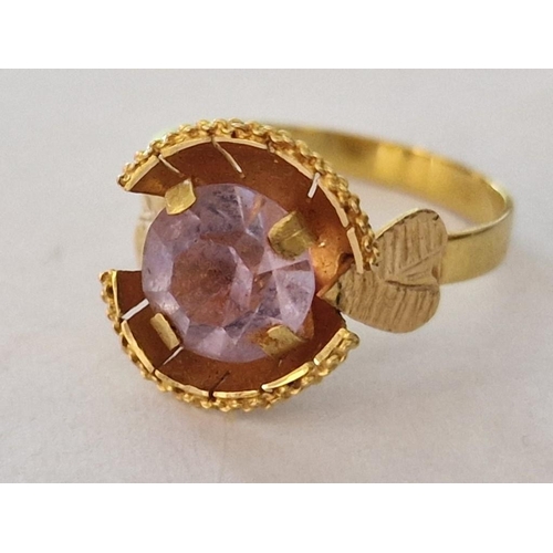 158 - 18ct Gold Ring with Large Light Purple Tone Round Stone in Raised Surround with Leaf Design Shoulder... 