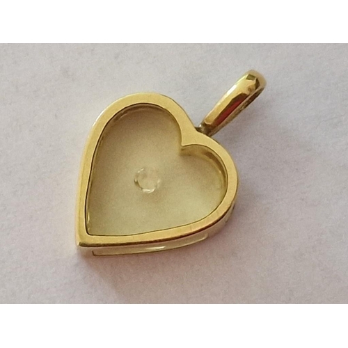 89 - 15ct Gold Heart Shaped Pendant with Glass Front & Back and Floating Clear Stone, (Approx. H: 18mm, 1... 