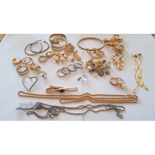 218 - Large Assorted Collection of Gold and Silver Tone Costume Jewelry, Inc. Chains, Necklaces. Earrings,... 