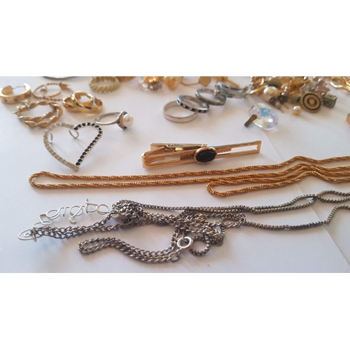 218 - Large Assorted Collection of Gold and Silver Tone Costume Jewelry, Inc. Chains, Necklaces. Earrings,... 