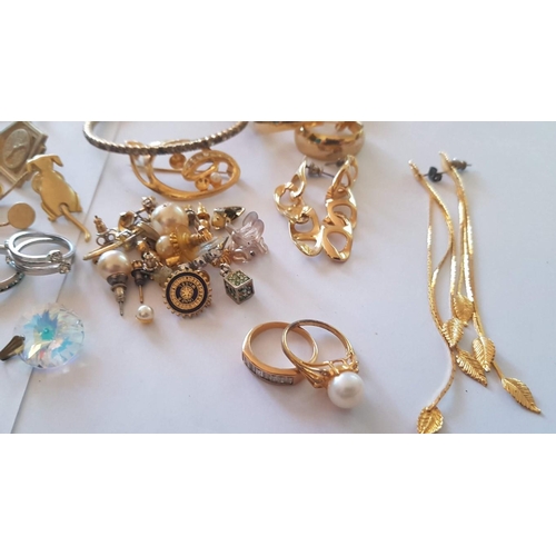 218 - Large Assorted Collection of Gold and Silver Tone Costume Jewelry, Inc. Chains, Necklaces. Earrings,... 