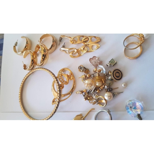 218 - Large Assorted Collection of Gold and Silver Tone Costume Jewelry, Inc. Chains, Necklaces. Earrings,... 