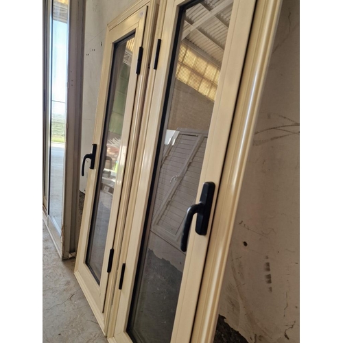 592 - Opposing Pair of Cream Colour Aluminium Double Glazed Windows in Frame, (Approx. 44 x 132cm each), (... 