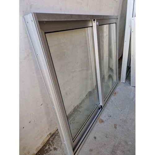 594 - Grey Colour Aluminium Sliding Double Glazed Windows in Frame, (Approx. 153 x 119cm)