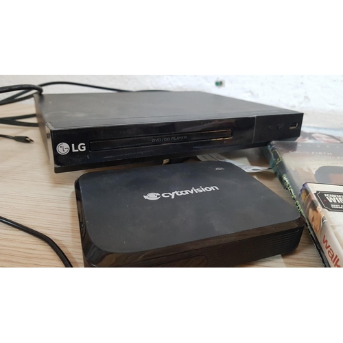 615 - LG DVD Player (Model: DP132) with Remote Control, Together with Collection of Assorted DVDs