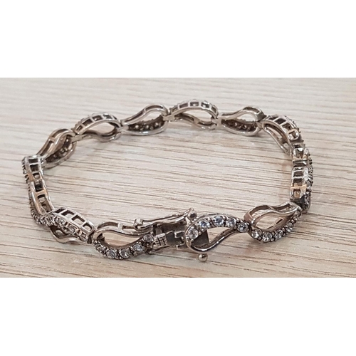 640 - Silver (925) Bracelet Decorated with Clear Stones, (Approx. L: 18cm, 13.9g)