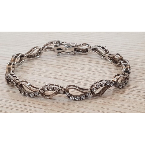 640 - Silver (925) Bracelet Decorated with Clear Stones, (Approx. L: 18cm, 13.9g)