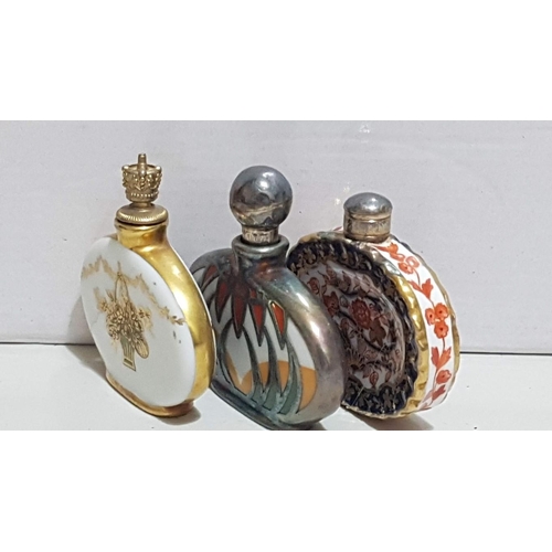 232 - Art Deco Perfume Flacons, Porcelain Polychrome Decoration, Oval-Fluted Form, Gold and Silver Tone St... 