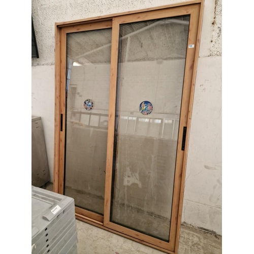 691 - Wood Effect Alumiunium Double Glazed Sliding Patio Doors in Frame, (Approx. 142 x 207cm)