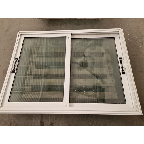 699 - White Alumiunium Double Glazed Sliding Windows in Frame, (Approx. 157 x 120cm)