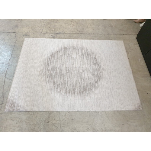 342 - Beige Colour Rug With Center Circular Pattern.
190 x 130 cm