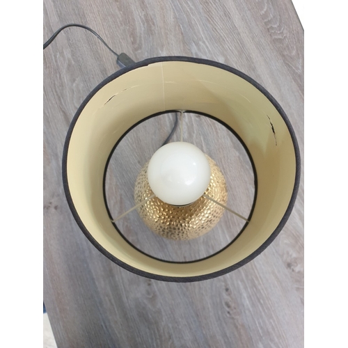 344 - Gold Colour Table Lamp With Black Shade. 32 cm High.
Working When Lotted