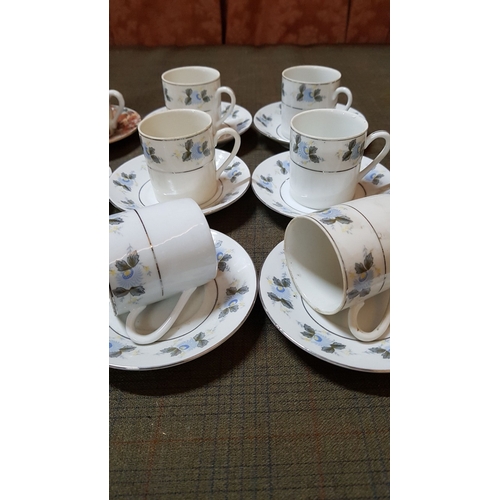 206 - 2x Classic Porcelain Sets in Different Pattern and Color, 6x Cups and 6x Saucers Each Set.   (24)