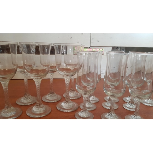 459 - Ordinary Wine Glasses (6x) and Champagne Flutes (10) with Twisted Leg. (16)