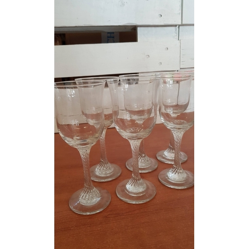 459 - Ordinary Wine Glasses (6x) and Champagne Flutes (10) with Twisted Leg. (16)