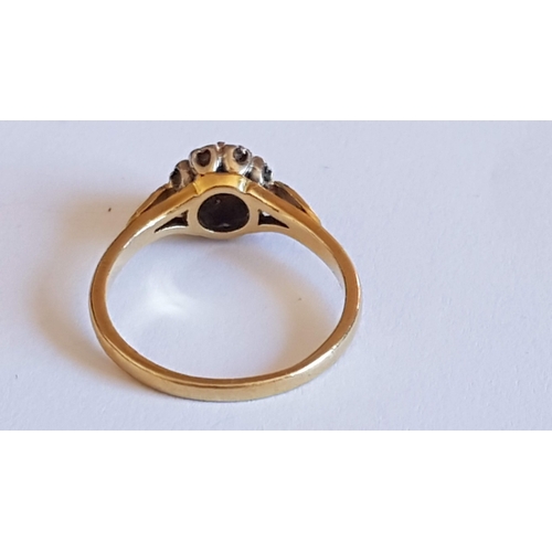 136 - 'Daisy' 18ct Gold Ring, Single Sapphire Stone (?)Surrounded by 8- Diamonds, Approx. 3.7g Size