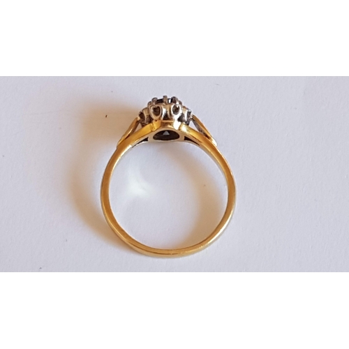 136 - 'Daisy' 18ct Gold Ring, Single Sapphire Stone (?)Surrounded by 8- Diamonds, Approx. 3.7g Size