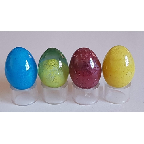 154 - Beautiful Collection of Glass Eggs in Different Colors Decorated with Turquoise Pendants on Plexygla... 