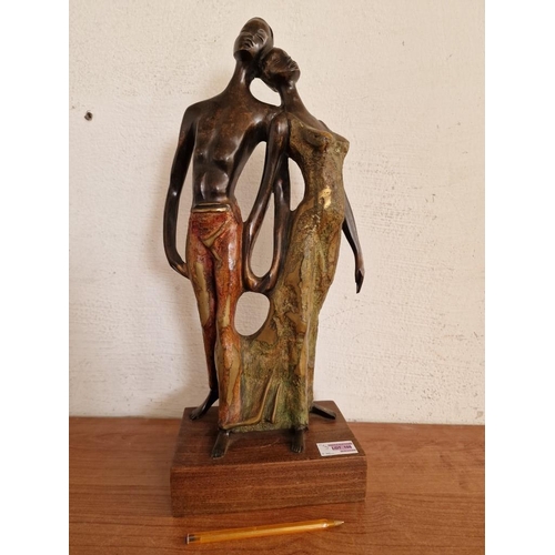 105 - Bronze Sculpture of Couple Holding Hands and Resting Heads on Each Other, Signed 'L M', on Wooden Ba... 