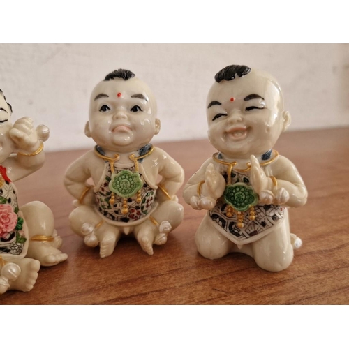 58 - Collection of 4 x Chinese Baby Figurines, Hand Painted Resin,   (Approx. Ave. H: 7cm), (4)