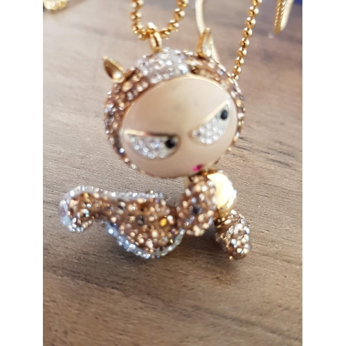 67 - 'ELIOT AND ERICA' Cool and Collectible Swarovski Pendants, Gold and Silver Tone, on Long Ball Bead C... 