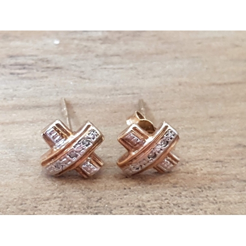 76 - Cross Shape, Stud Type Pair of 14ct Yellow Gold Earring, Decorated with Tiny Diamond, Approx. 1.1g.