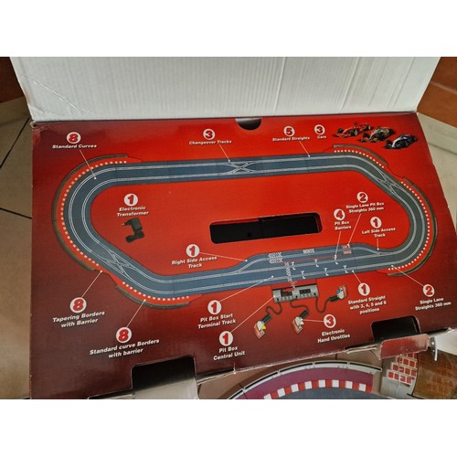 Large Qty of Scalextric; 'SCX' 1:32 Scale Racing System Box Set with ...