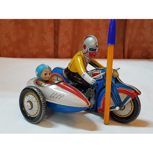 17 - Mid 20th century clockwork motor bike & sidecar Ollie Nygren rode one like this, working when listed... 