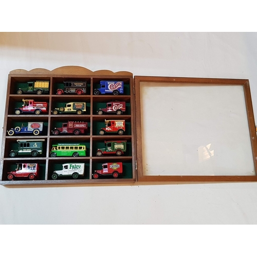 12 - Wooden glass fronted display case containing 15 x Lledo die cast commercial vehicles – unit is 33cm ... 