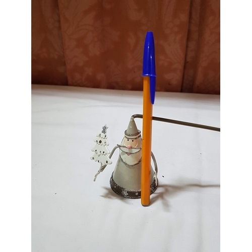 101 - Metal Christmas Art; 3x Lanterns and 4x Candle Snuffers. (7)