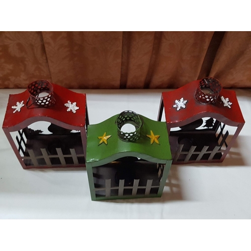 101 - Metal Christmas Art; 3x Lanterns and 4x Candle Snuffers. (7)