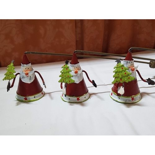 101 - Metal Christmas Art; 3x Lanterns and 4x Candle Snuffers. (7)