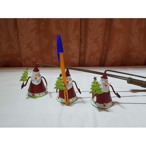 101 - Metal Christmas Art; 3x Lanterns and 4x Candle Snuffers. (7)