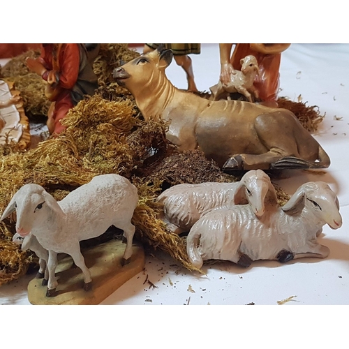 72 - Christmas Nostalgia- Beautiful Nativity Scene with Wooden Figurines in Retro Style.