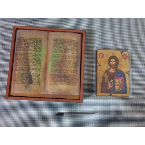 642D - Replica Of the 'Silver Bible' Together With A wooden Icon Of Jesus Christ.