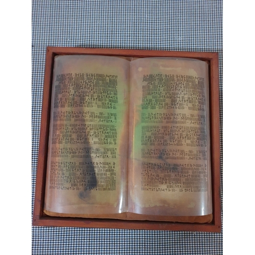 642D - Replica Of the 'Silver Bible' Together With A wooden Icon Of Jesus Christ.