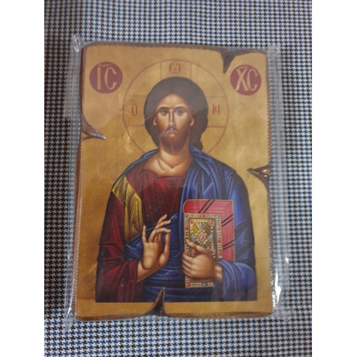 642D - Replica Of the 'Silver Bible' Together With A wooden Icon Of Jesus Christ.